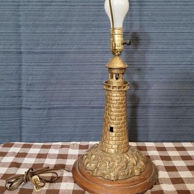 Lot 188: Vintage Unmarked Brass Lighthouse Lamp (weighs over 10lbs.) 