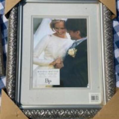 Lot 227: (2) Picture Frames (Large Silver & Small Gold Gilt)