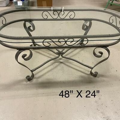 Lot 208  Oval Coffee Table with Gray Tone Iron Base