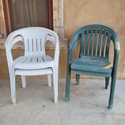 Lot 242: (4) Outdoor Plastic Weather Safe Patio Chairs 