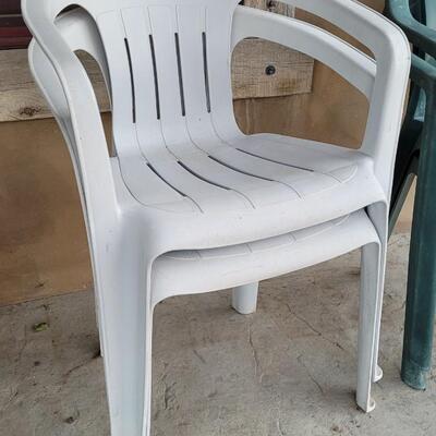 Lot 242: (4) Outdoor Plastic Weather Safe Patio Chairs 