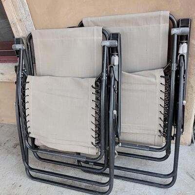 Lot 245: (2) Folding Patio Chairs Zero Gravity 