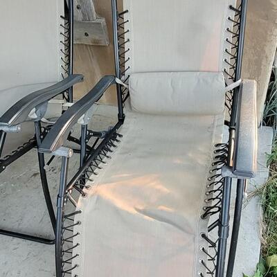 Lot 245: (2) Folding Patio Chairs Zero Gravity 