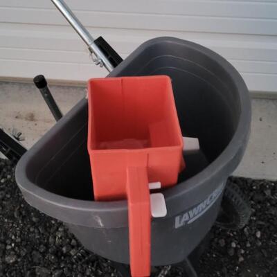 Lot 261: (2) Seed Broadcasting Tools