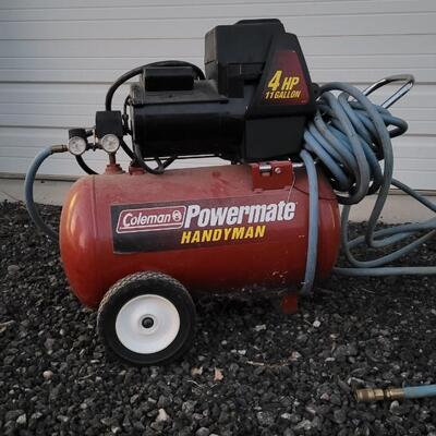 Lot 262: COLEMAN 4HP 11 Gallon PowerMate Handyman Air Compressor w/ Air Hose WORKS