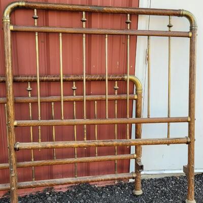 Lot 282: Antique Cast Iron and Brass Bed (w/ Wood Veneer Accents)
