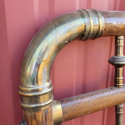 Lot 282: Antique Cast Iron and Brass Bed (w/ Wood Veneer Accents)