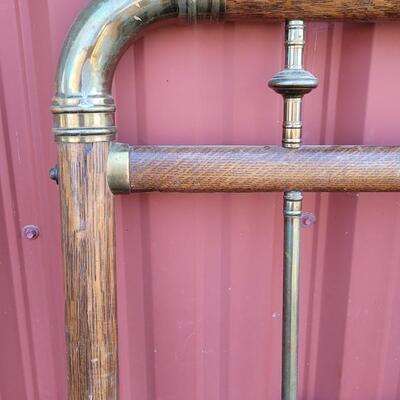 Lot 282: Antique Cast Iron and Brass Bed (w/ Wood Veneer Accents)
