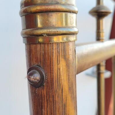 Lot 282: Antique Cast Iron and Brass Bed (w/ Wood Veneer Accents)