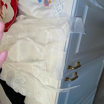 Lot 221  Six Vintage Aprons