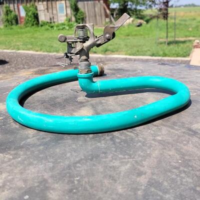 Lot 339: Green Metal Sprinkler
