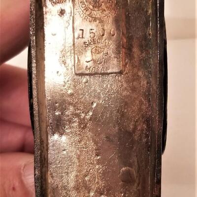 Lot #38  Antique Silverplate Figural Napkin Ring
