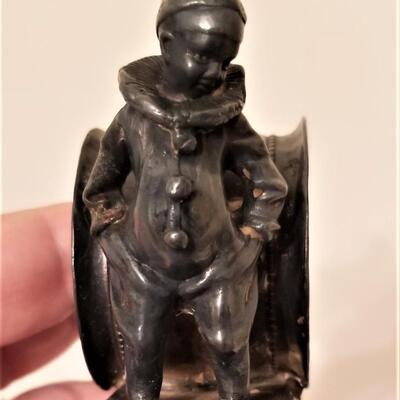 Lot #38  Antique Silverplate Figural Napkin Ring