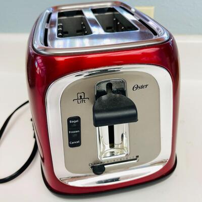 LOT 38  RED OSTER 2 SLICE TOASTER 