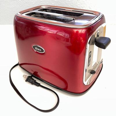 LOT 38  RED OSTER 2 SLICE TOASTER 
