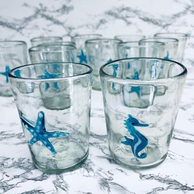 LOT 45 ST  SET OF 12 SHORT TUMBLERS WITH APPLIED GLASS SEA HORSES & STARFISH