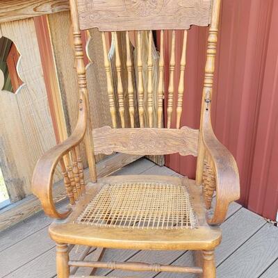 Lot 20: Antique North Wind Rocker with Cane Seat late 1800's/early 1900's