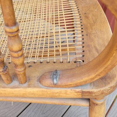 Lot 20: Antique North Wind Rocker with Cane Seat late 1800's/early 1900's