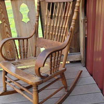 Lot 20: Antique North Wind Rocker with Cane Seat late 1800's/early 1900's