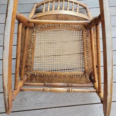 Lot 20: Antique North Wind Rocker with Cane Seat late 1800's/early 1900's