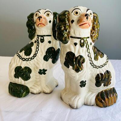 LOT 70  ST  ANTIQUE PAIR OF STAFFORDSHIRE SPANIEL DOGS GREEN & BROWN LUSTER 