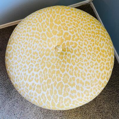 LOT 83  GOLD LEOPARD PRINT UPHOLSTERED OTTOMAN POOF