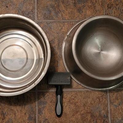 Lot 29: Extra Large Dog Bowls and a Pet Brush