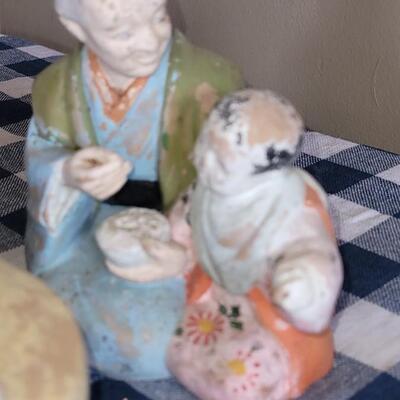 Lot 57: Antique Chalkware Asian Family Enjoying a Meal Together Figures 