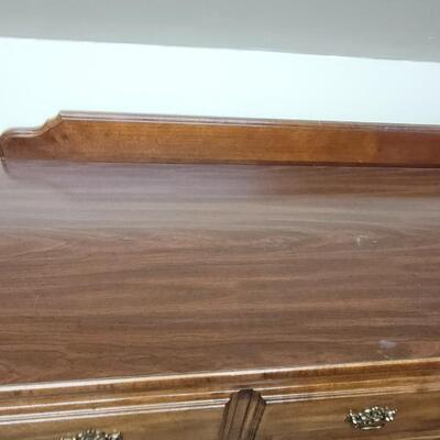 Lot 90: STANLEY 4 Drawer 6ft. Long Dresser #2 (has a little damage, piece is still attached and can be repaired)