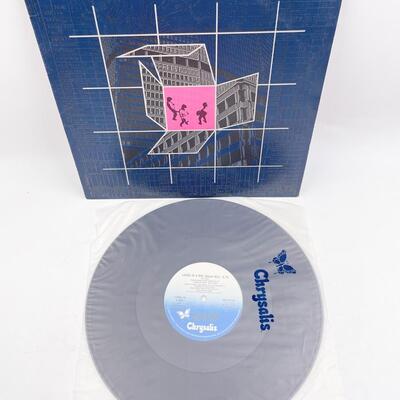 â€œLIVING IN A BOXâ€ SINGLE VINYL RECORD