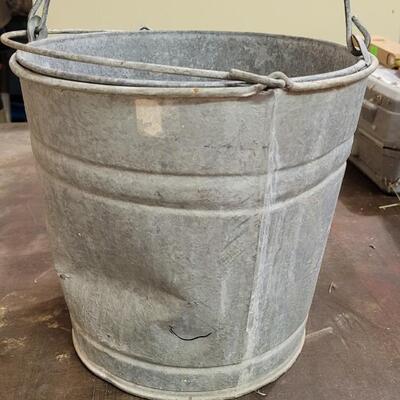 Lot 121: Vintage Metal Buckets (one stuck in other) + Rope Remnant 
