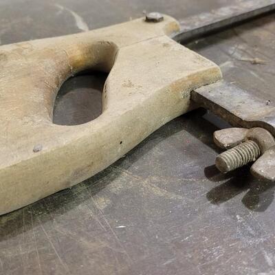 Lot 125: (2) Vintage Large Hand Saws