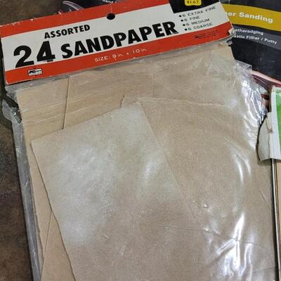 Lot 128: Assorted Sandpaper Packs + (2) Safety Glasses and Pack of Dust Masks