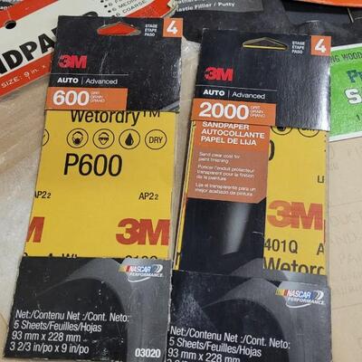 Lot 128: Assorted Sandpaper Packs + (2) Safety Glasses and Pack of Dust Masks