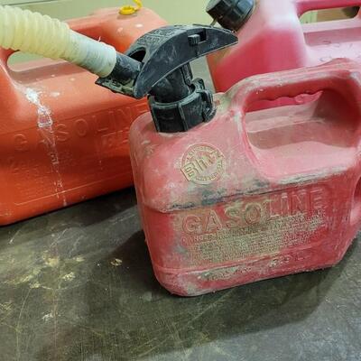 Lot 132: (3) Red Plastic Gas Cans 