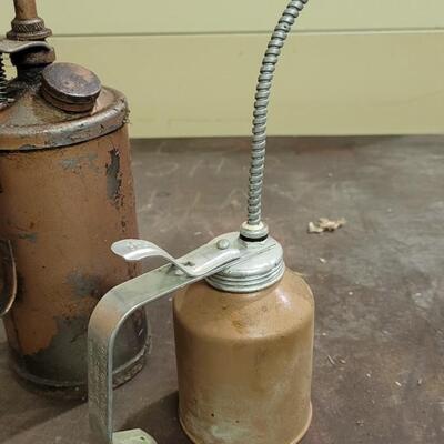 Lot 137: (2) Vintage Oil Cans by Golden Rod
