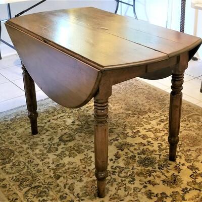 Lot #94  Antique Oak Dropleaf Dining Table - 2 leaves