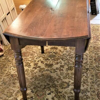 Lot #94  Antique Oak Dropleaf Dining Table - 2 leaves