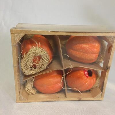 Crate with ceramic miniature pumpkin 