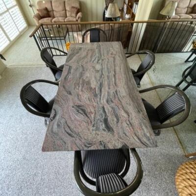 Granite slab dining table with 6 lacquered ash chairs
