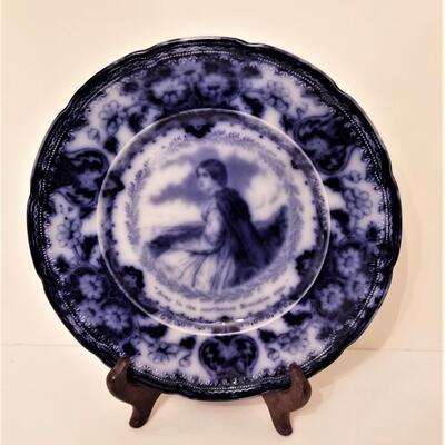 Lot #119  Fantastic Antique Flow Blue Plate featuring "Evangeline" - poem on reverse