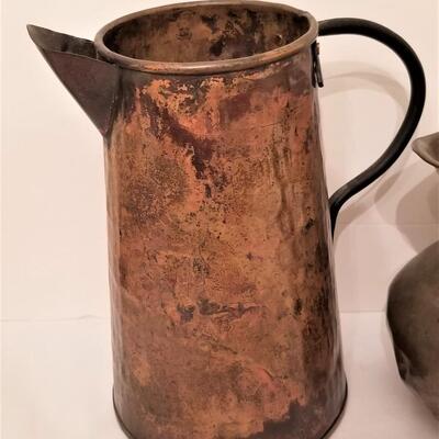 Lot #130 Lot of 3 pitchers - copper & stoneware