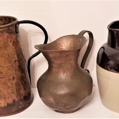 Lot #130 Lot of 3 pitchers - copper & stoneware