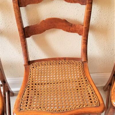 Lot #134  Set of 4 Bird's Eye Maple Caned chairs