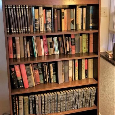 Lot #148  Lot of over 100 hardcover books (bookcase not included).