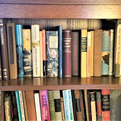 Lot #148  Lot of over 100 hardcover books (bookcase not included).