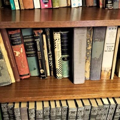 Lot #148  Lot of over 100 hardcover books (bookcase not included).