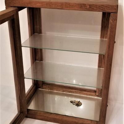 Lot #149  Cute little wooden display case with glass shelves