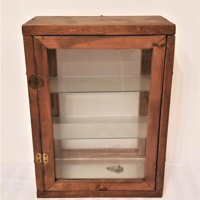 Lot #149  Cute little wooden display case with glass shelves