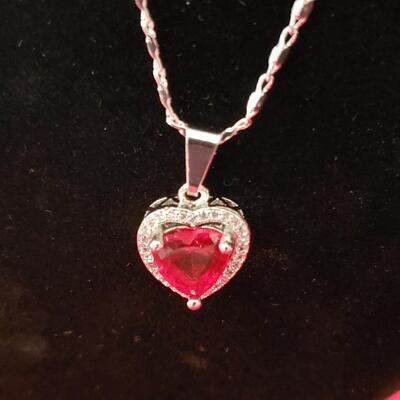 Sterling silver heart  garnet and diamond pendant  and necklace 